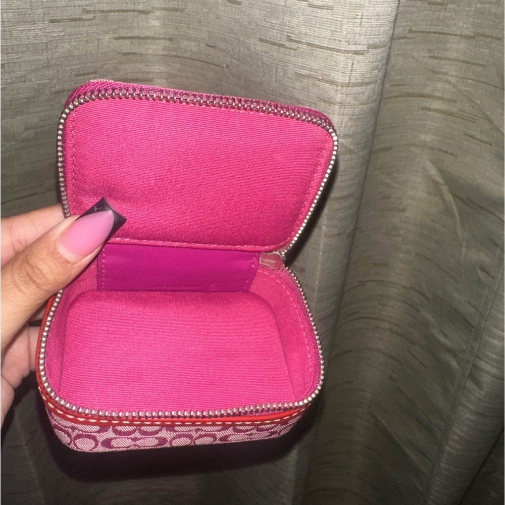Hot pink coach cosmetic case